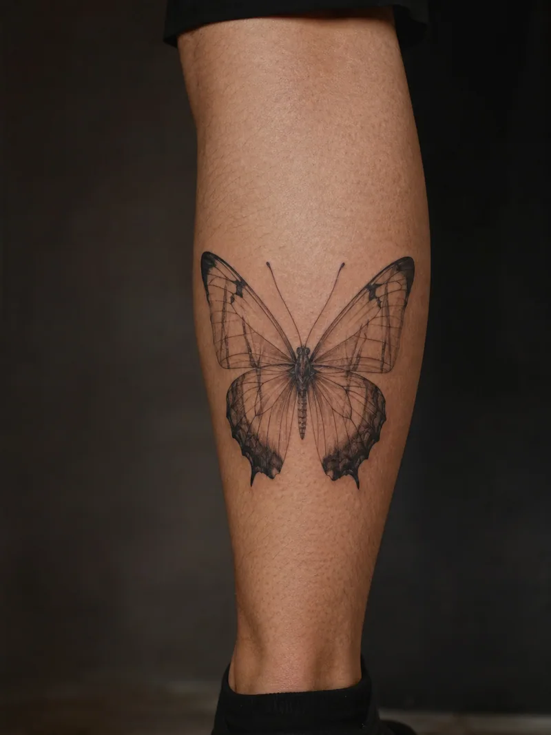 X-ray butterfly tattoo - Translucent-looking wings reveal delicate internal structures.