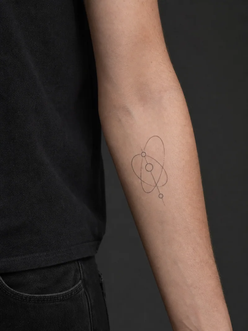 Abstract orbit tattoo - Three circles connect through clean orbital arcs.