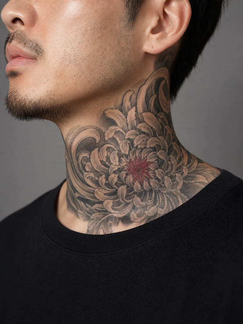 Chrysanthemum neck tattoo - large chrysanthemum wrapping toward the nape with a restrained red centre
