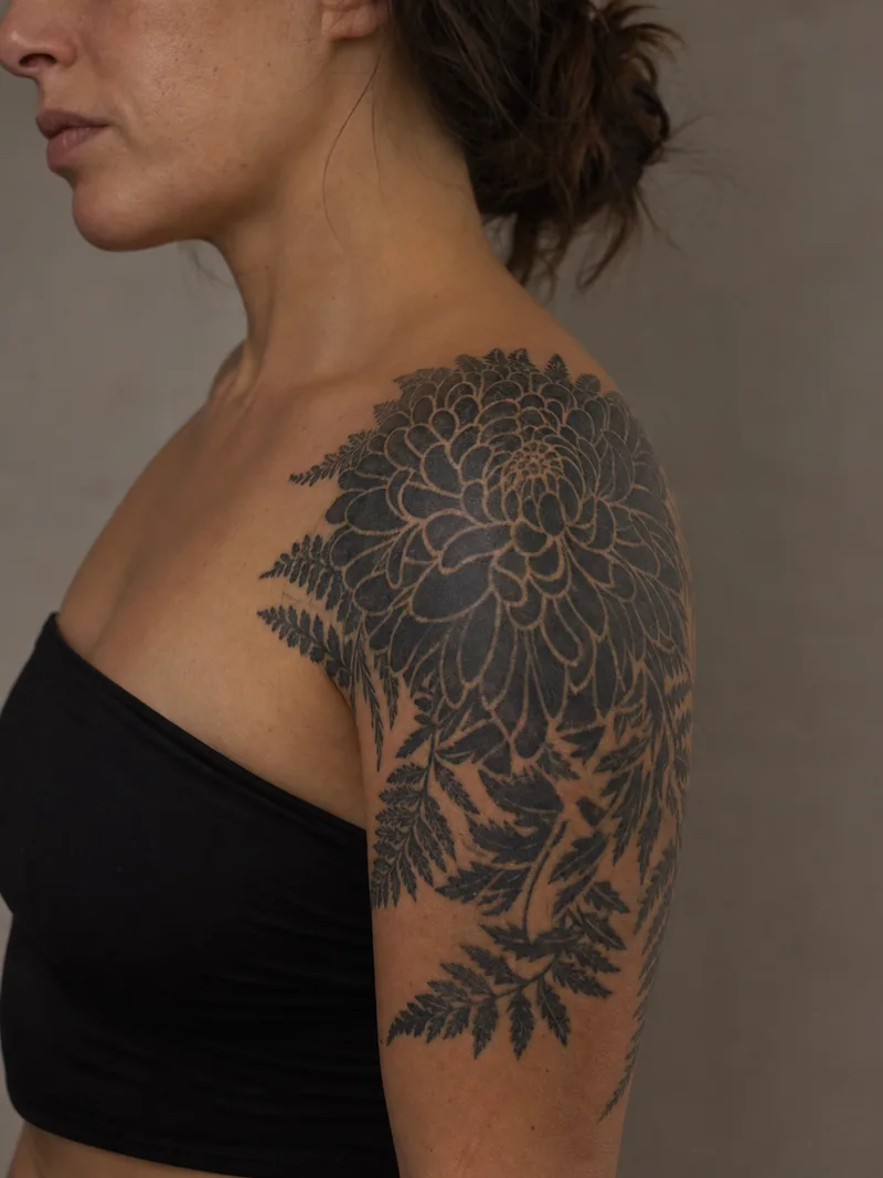 Chrysanthemum shoulder cover-up - dense chrysanthemum and ferns designed to conceal a faded older tattoo