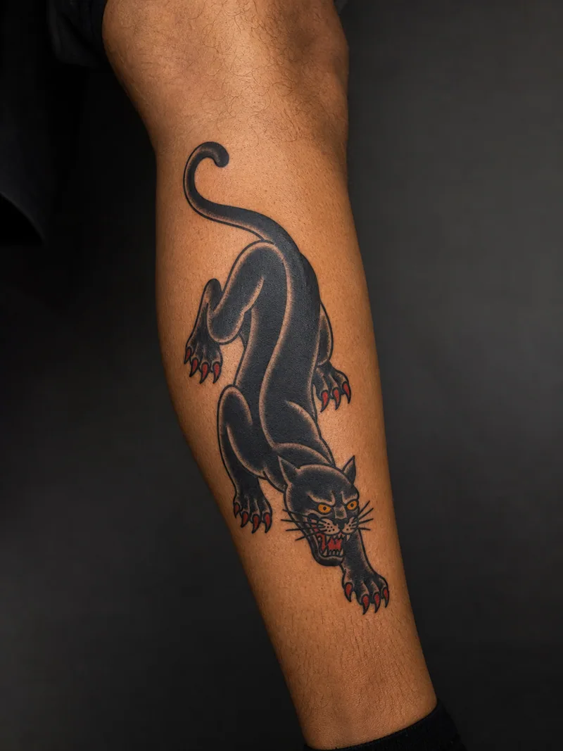Crawling panther tattoo - a bold crawling panther arranged on a strong diagonal