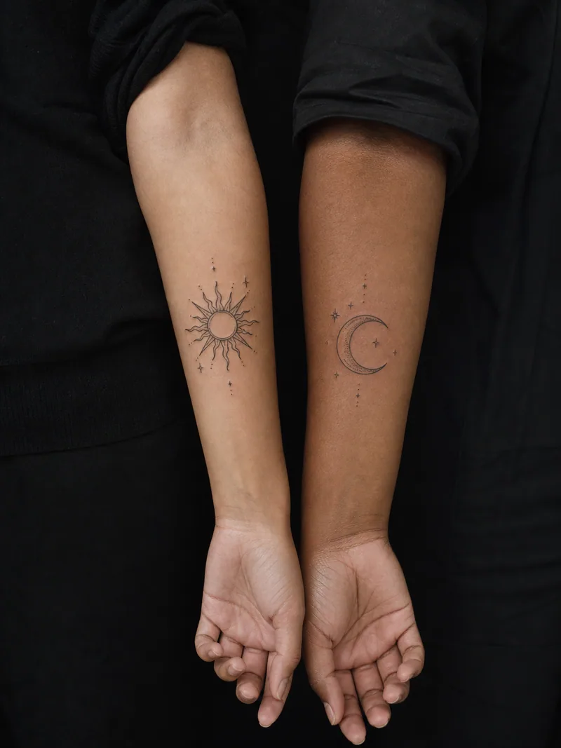 Matching sun and moon tattoos - complementary engraved sun and crescent with tiny stars