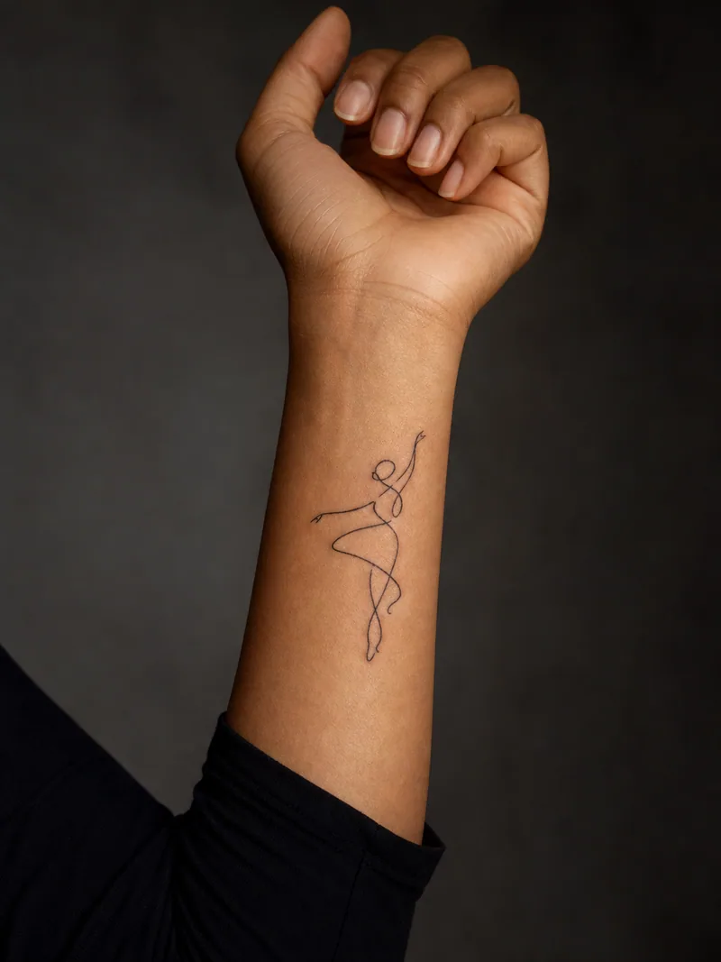 Single-line dancer tattoo - One continuous line captures a dancer in a loose, expressive pose.